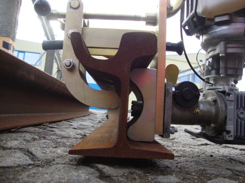 Příslušenství - držák pro žlábkové kolejnice